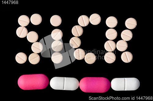 Image of Sick Word made out of pills