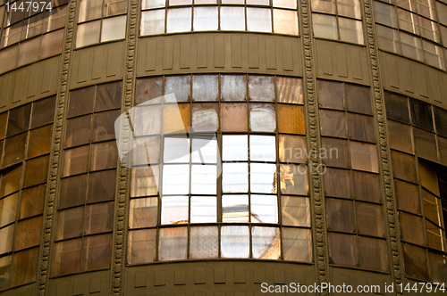 Image of Old industrial building with reflection and windows