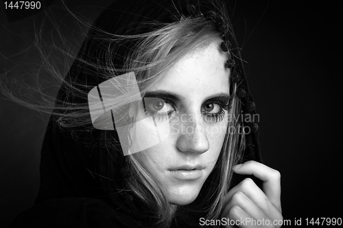 Image of Fashion photo of a beautiful girl with hood