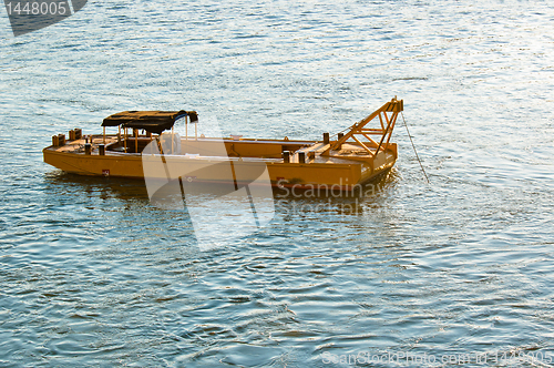 Image of Old Boat on beautiful blue water