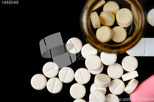 Image of Pills on black background