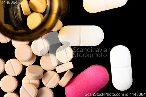Image of Pills on black background