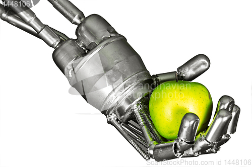 Image of Robot hand with green apple on isolated white background