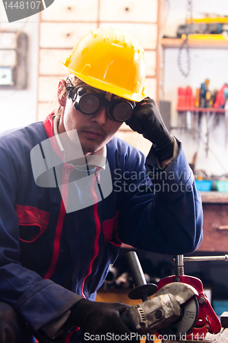 Image of Industrial worker and his tools