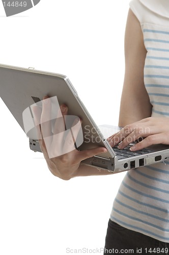 Image of woman holding a laptop