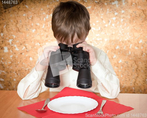 Image of child with binoculars