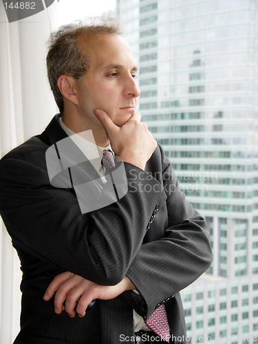 Image of Businessman by the window