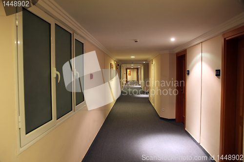 Image of A long hotel corridor