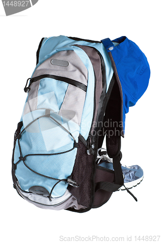 Image of hiking equipment, rucksack ,boots  and Cap isolated on white