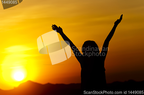 Image of Woman in Sunset