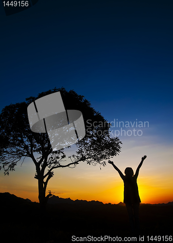 Image of Woman in Sunset