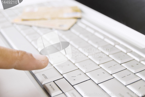 Image of Computer Keyboard and finger