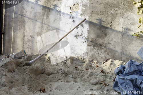 Image of shovel in the sand