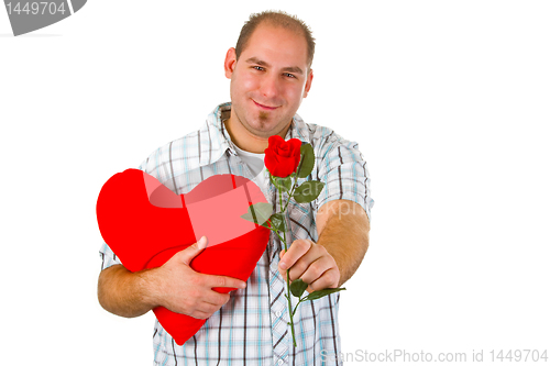 Image of Young man holding red heart