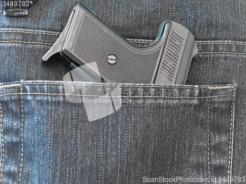 Image of pocket with pistol