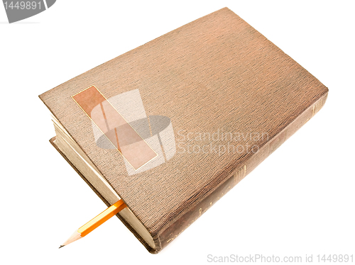 Image of book and pencil