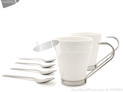 Image of white modern cups and spoons