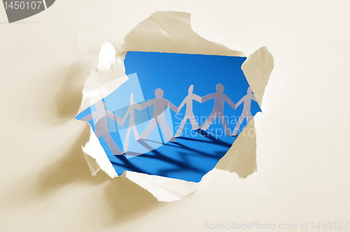 Image of paper man in a hole