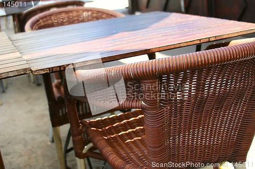 Image of Table  and cane chair