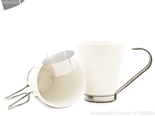 Image of two white modern cups