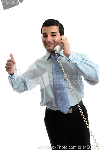 Image of Successful businessman on telephone