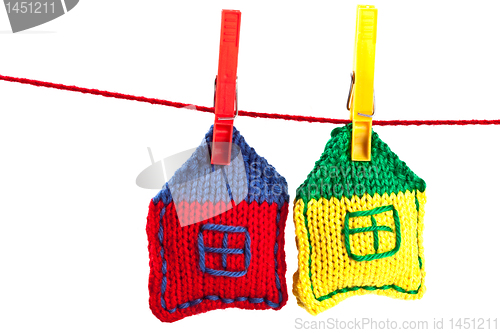 Image of two knitted colorful houses 