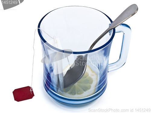 Image of cup lemon and pack of tea