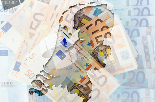 Image of Outline map of Netherlands with transparent euro banknotes in ba