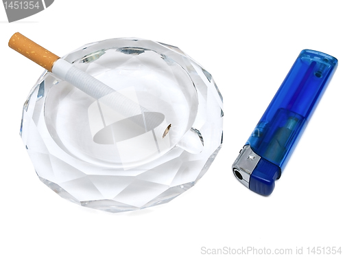 Image of ashtray,cigarette and lighter