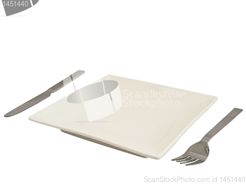 Image of Plate, knife and fork against white
