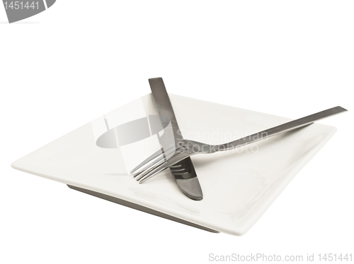 Image of Plate with crossing knife and fork