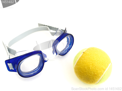 Image of Swimming glasses and tennis ball