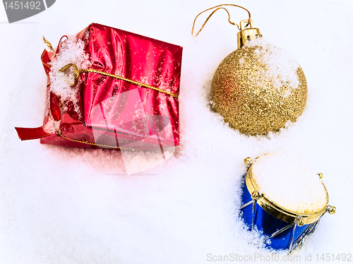 Image of christmas toys in snow