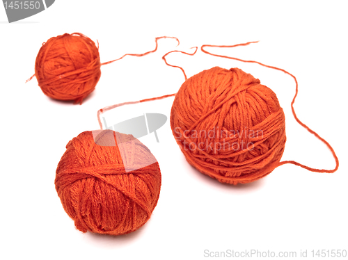 Image of red yarns clews