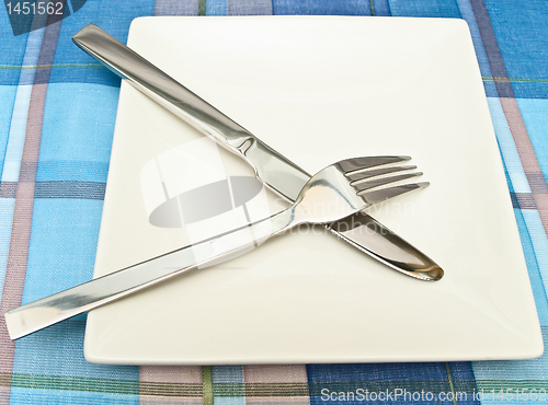 Image of dish with fork and knife