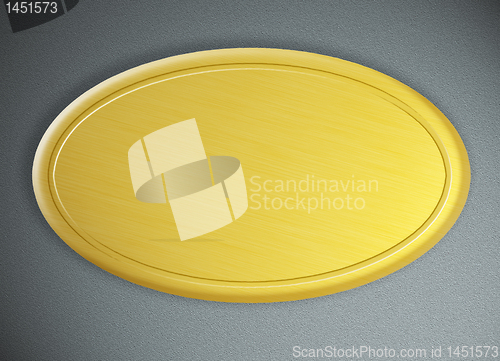 Image of Round golden frame against metal background