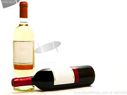 Image of red and white wine bottles