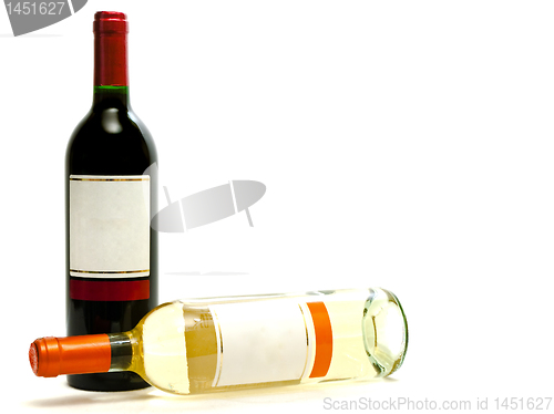 Image of red and white wine bottles
