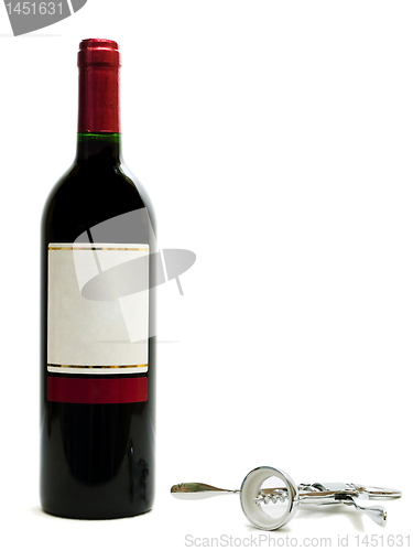 Image of red wine bottles with corkscrew