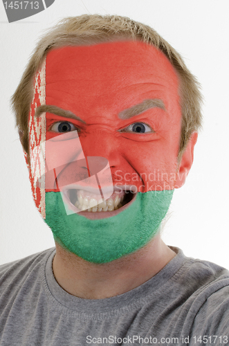 Image of Face of crazy angry man painted in colors of belarus flag