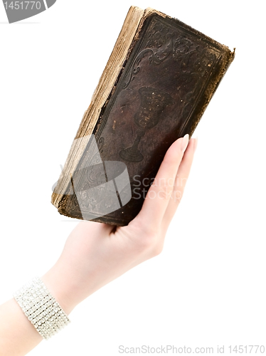 Image of book in woman hand