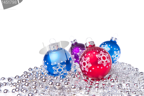 Image of christmas balls with tinsel