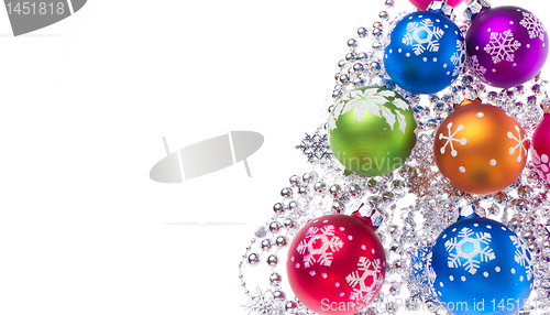 Image of christmas balls with snowflake symbols