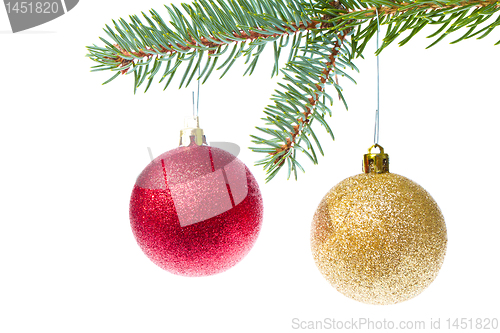Image of red christmas ball hanging from tree