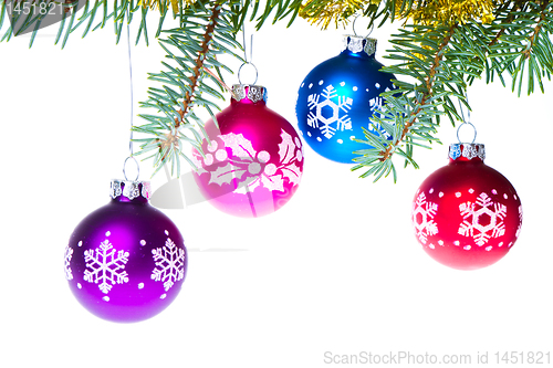 Image of christmas balls on spruce branch