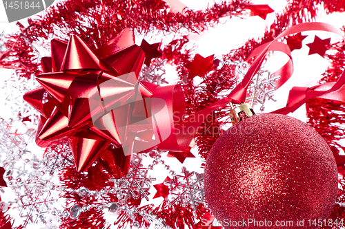 Image of ball with ribbon and tinsel