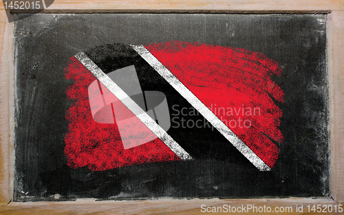Image of flag of trinidad and tobago on blackboard painted with chalk  