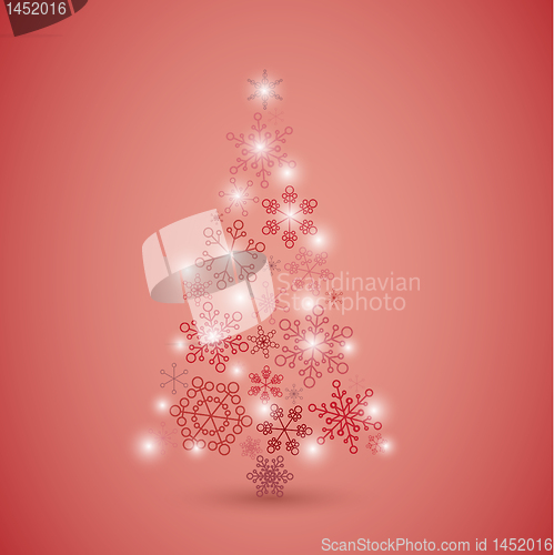 Image of Christmas tree made from red snowflakes