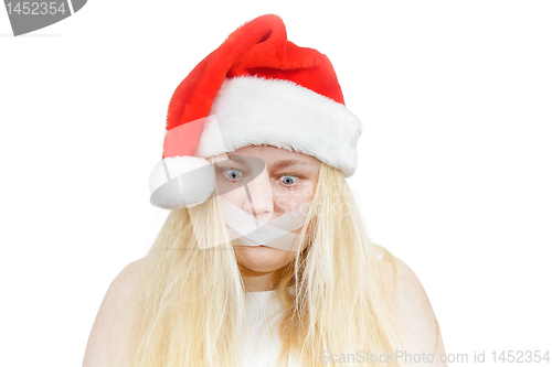 Image of crazy girl in a Santa hat