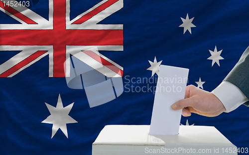 Image of man voting on elections in australia